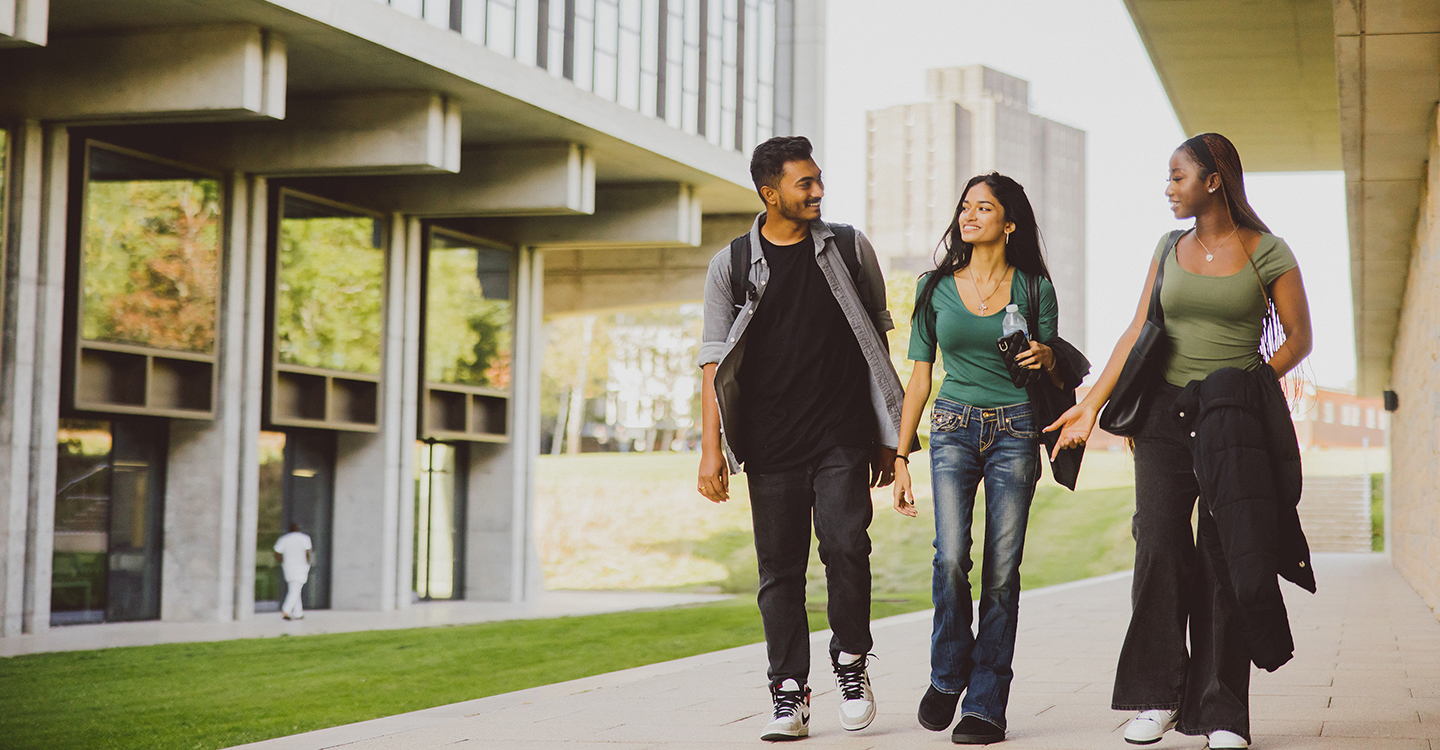 Students walking outside University of Essex building